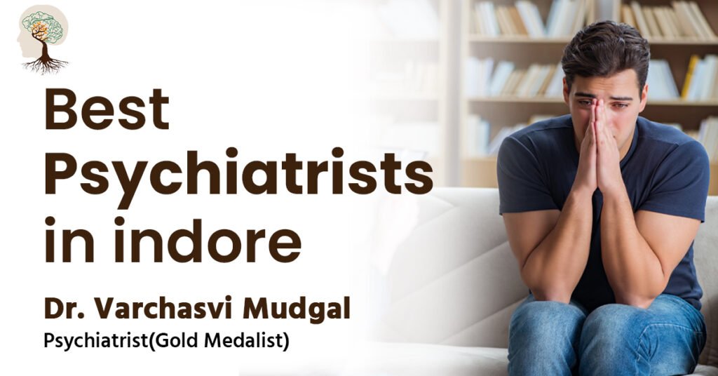A promotional banner for "Best Psychiatrists in Indore," highlighting "Dr. Varchasvi Mudgal, Psychiatrist(Gold Medalist)," alongside a symbolic brain/tree graphic and a photo of a distressed man.