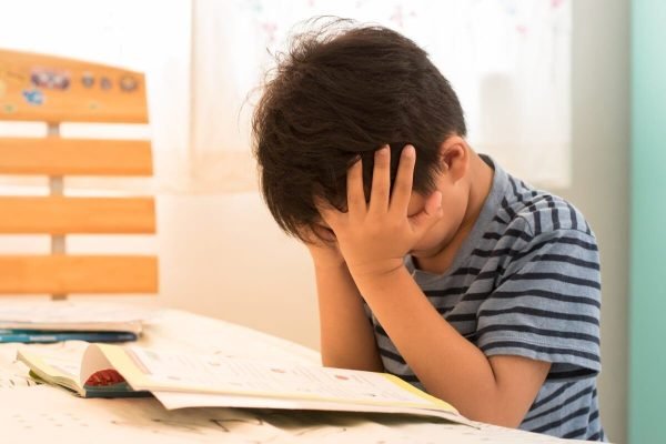 Child with autism spectrum disorder facing learning and emotional challenges treated by psychiatrist in Indore