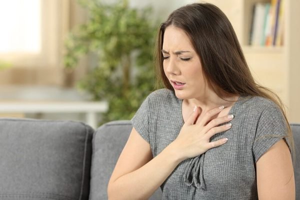 Woman experiencing panic attack symptoms receiving anxiety treatment from psychiatrist in Indore