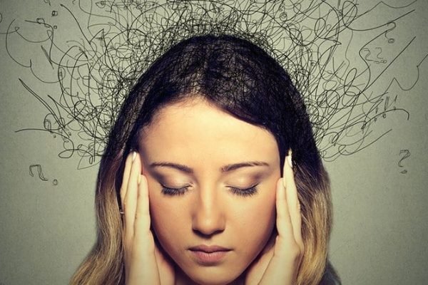 Woman experiencing obsessive compulsive disorder symptoms treated by psychiatrist in Indore for intrusive thoughts